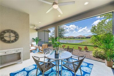 Sunroom with a water view and ceiling fan