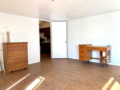 Front Living Room with dark hardwood / wood-style 
