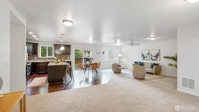 You’ll feel it the moment you walk in. Big, open, and welcoming... this great room just invites you to kick back and stay awhile.