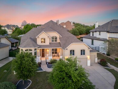 View of front facade featuring a yard, stucco sid