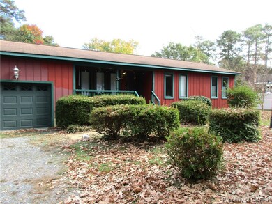 Single story home with a garage