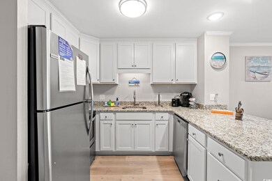 Kitchen featuring appliances with stainless steel 