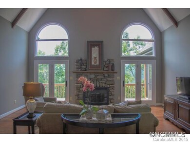 Vaulted Ceiling and Wood FP