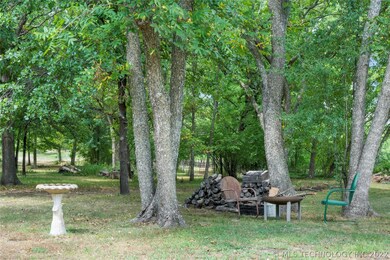 A birdbath invites wildlife and the outdoor fire p