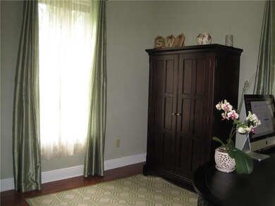 Dining room with entry to kitchen and family room