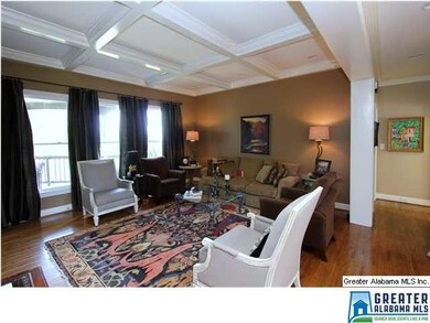 FAMILY ROOM WITH COFFERED CEILINGS, HIGH WINDOWS W