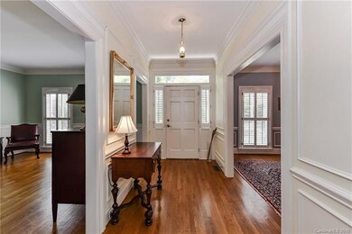 Foyer area and entrances into formal dining room a