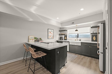 Kitchen open to living and dining