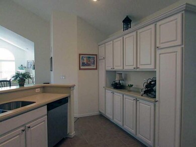Kitchen. Coffee bar or serving area surrounded by 