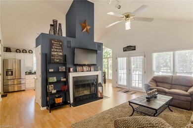 The great room has been remodeled several times over the years, adding french doors, opening up the kitchen. It's a unique and inviting space