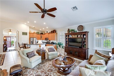 Living room with beautiful neutral tile flooring