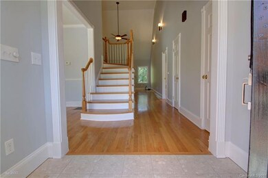 FOYER: Inviting foyer entry with tile floor landin
