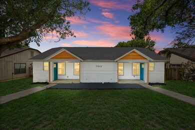 Ranch-style house featuring brick siding and roof