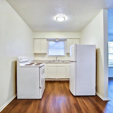 Kitchen with range and refrigerator included!