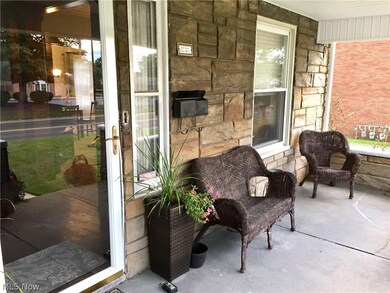 View of front porch with plenty of room for relaxing