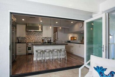 Bifold glass doors that open with a finger tip bri