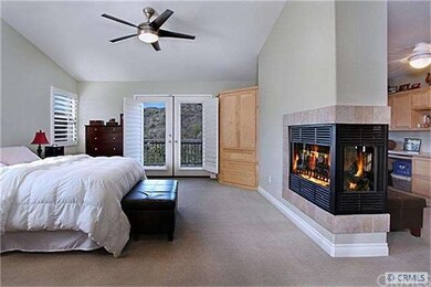 Warm and spacious master bedroom with balcony and 