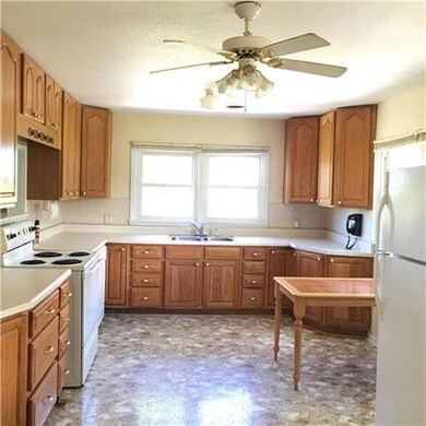 Wood Cabinets, Appliances and Lots of Natural Ligh