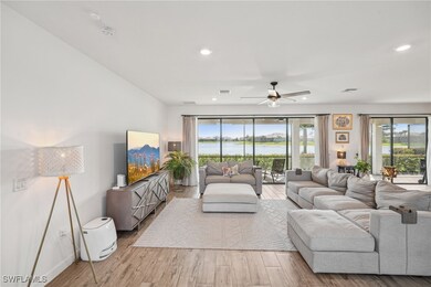 Living room featuring recessed lighting, visible v