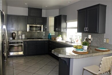 Beautifully remodeled kitchen with granite counter