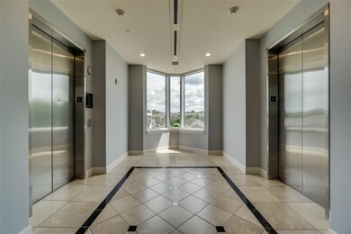 Hall off elevator on 5th floor.