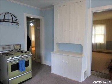 Kitchen. Charming antique kitchen cupboard has lot