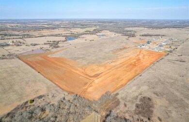 Drone / aerial view with a desert view and a rural