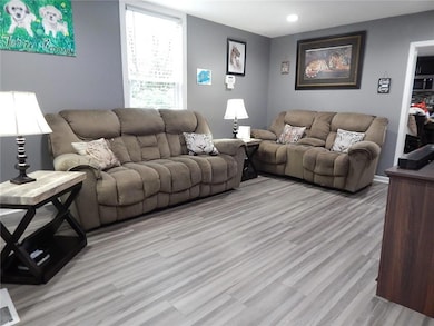 Living area featuring light wood-type flooring