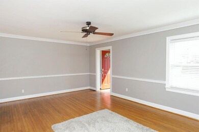 This living room has plenty of windows t