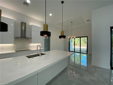 128 5th St SW, Naples, FL 34117 - photo 6