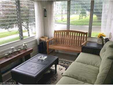 RELAX & ENJOY THE FANTASTIC ENCLOSED FRONT PORCH.