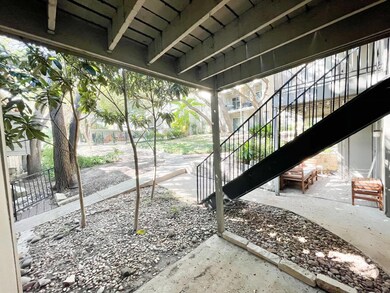 View of patio featuring stairs