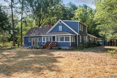 View of front of house featuring a front yard and