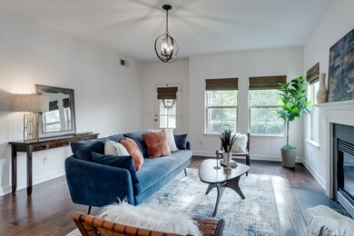 Contemporary light fixtures, gas fireplace, practical layout