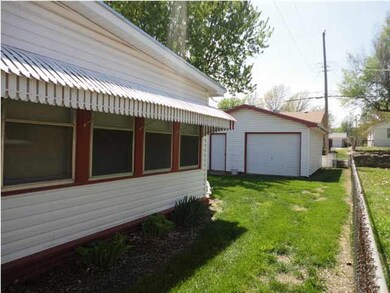 North side of Home leading to Extra Garage in Back