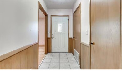 Detached garage featuring driveway