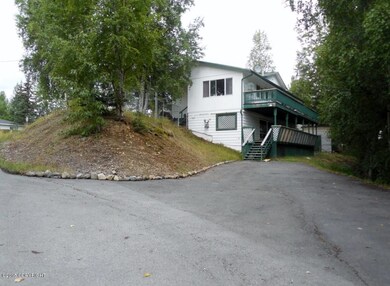 Back of Home w/Paved Parking Too!