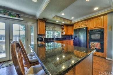 Kitchen has recess lighting and a large island