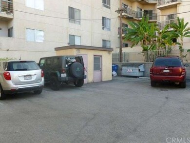 More parking spaces for tenants.   All parking spots, 12 of them, are assigned to tenants.  The small 'building' is just a storage area the owner uses.