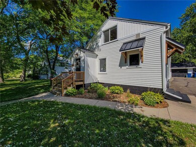 Beautiful landscaping and a huge yard greet you as
