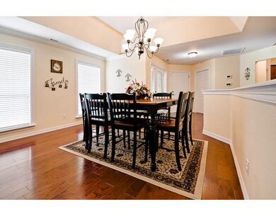 Dining Room. Formal dining area with wood floors convenient to kitchen.