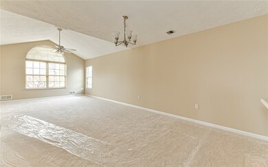 Dining room area with new chandelier.