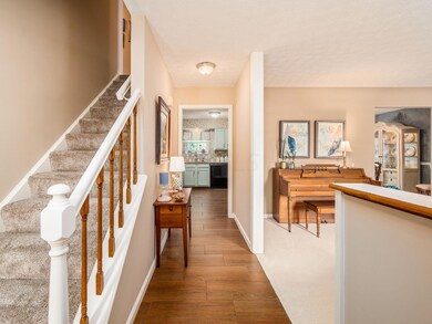 ENTRY WITH WOOD LOOK CERAMIC FLOOR!