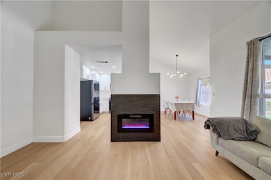 Living area featuring light wood-style flooring, h
