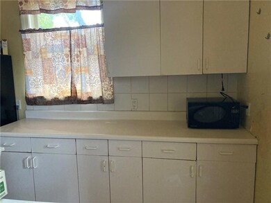 good sized kitchen with pantry