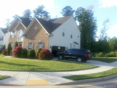this photo shows side entry two-car garage  and pa