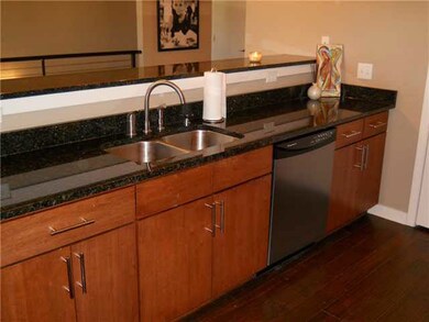 Undermount sink, modern kitchen cabinet handles.