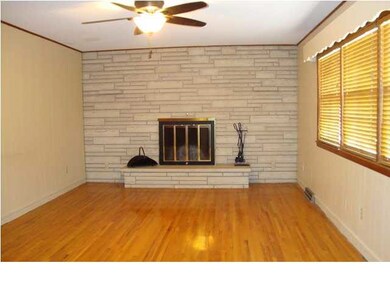 Spacious living room with Silverdale woodburning f