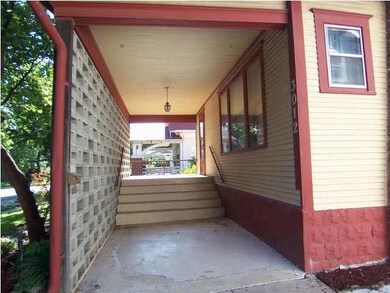 Private covered porch, provides added space outdoo