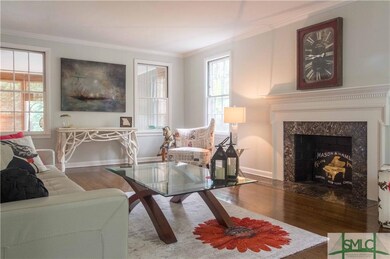 Large, separate living room with cozy fireplace.